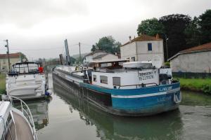 Barge edges past our boats