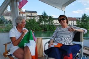 Aine sewing us a new Irish flag- Nuala watching