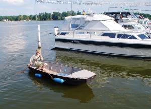 Adrian has not perfected his walking on water skills yet - so he borrowed the marina punt
