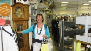 Nuala in charity shop-note grin on her face