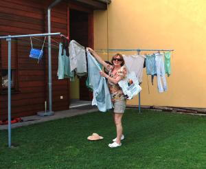 Nuala hanging out the washing- note the Waterford Tall Ships bag