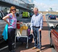 Adrian and Nuala leave for Germany- note Adrian has borrow a walking stick