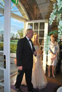 Bill walks Lorna up the aisle