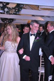 Lorna and John greeting guests after the ceremony