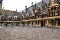 Inner yard of Hospice- note painted roof tiles