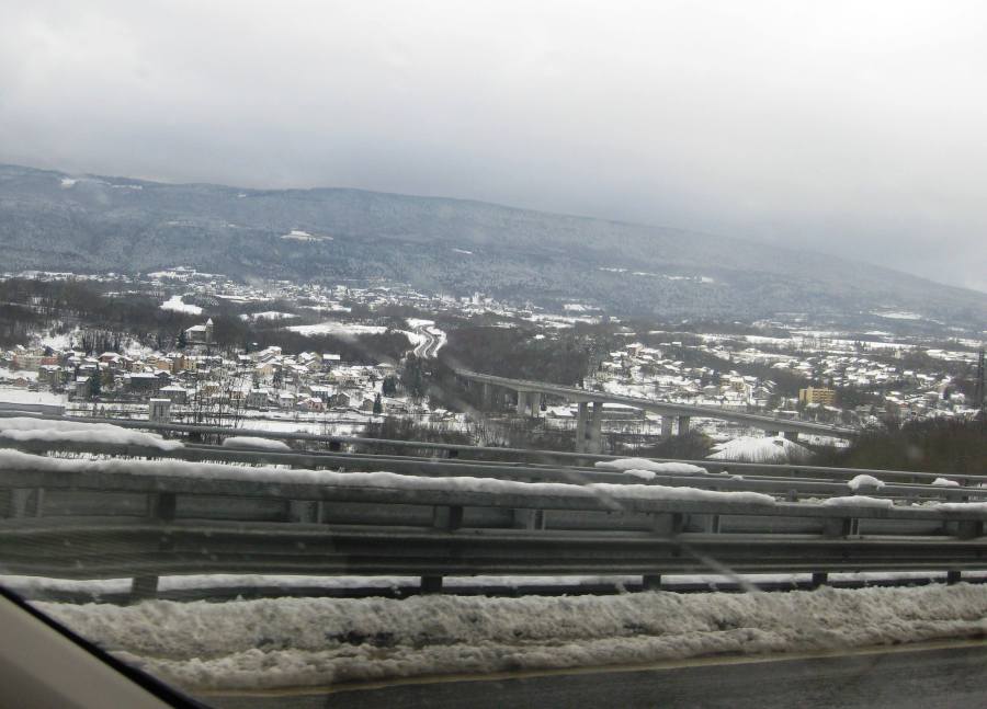 Snow on the Alps - on motorway back from Geneva