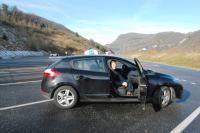Nuala in the hired car Alps in backround